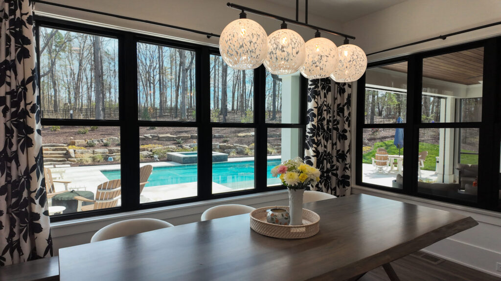 black vinyl windows in a dining area
