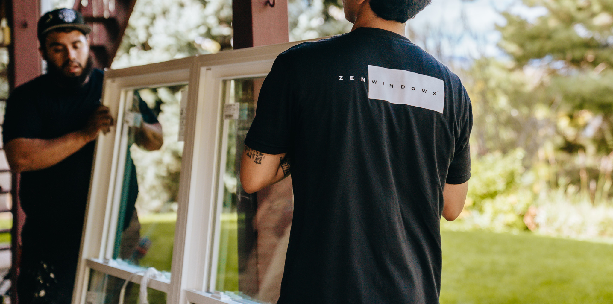 Zen workers carrying a window