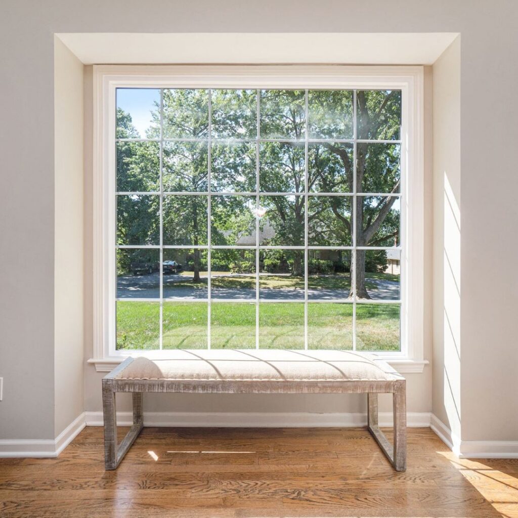 sunlight streaming through a picture window with grids