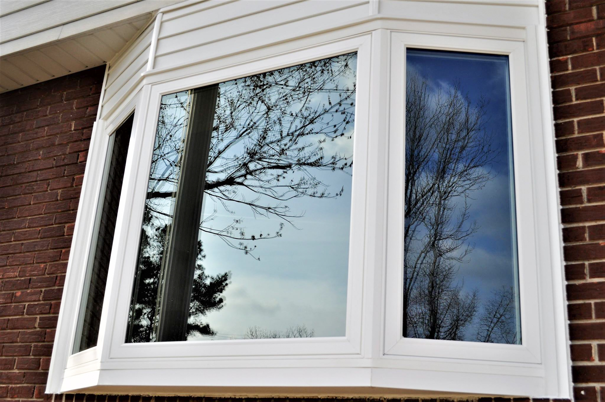Closeup of white bay window.