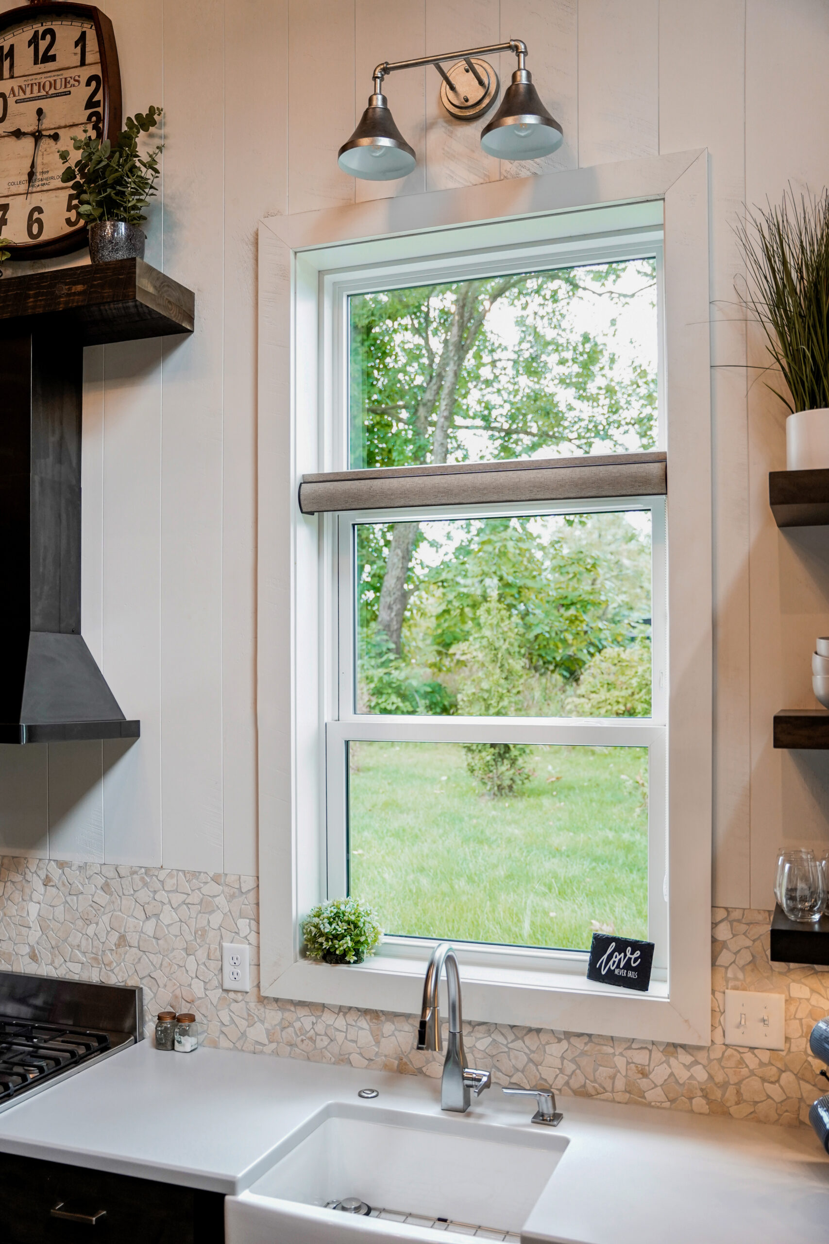 Double-hung window over a kitchen sink.