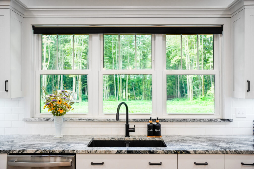 Double-hung windows over kitchen sink.