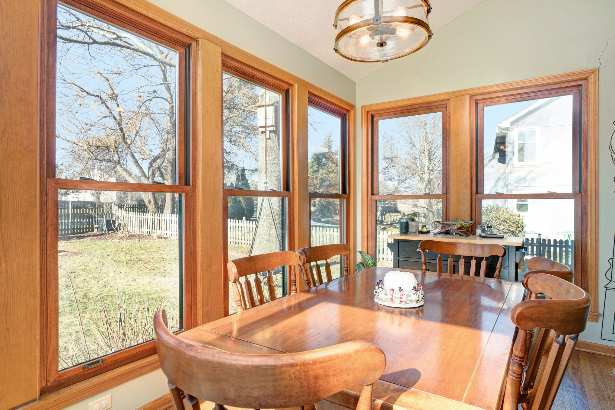 Double-hung wood grain windows.