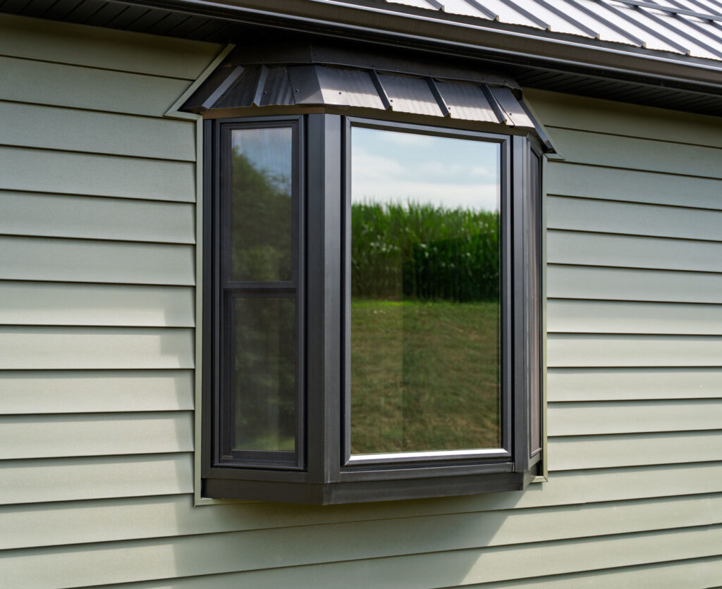 Image courtesy of ProVia - Endure bow window in matte coal black.