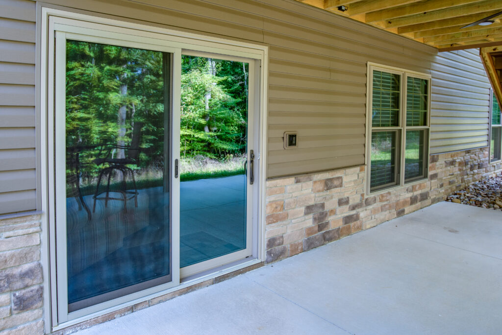 Endure sliding patio door with screen.