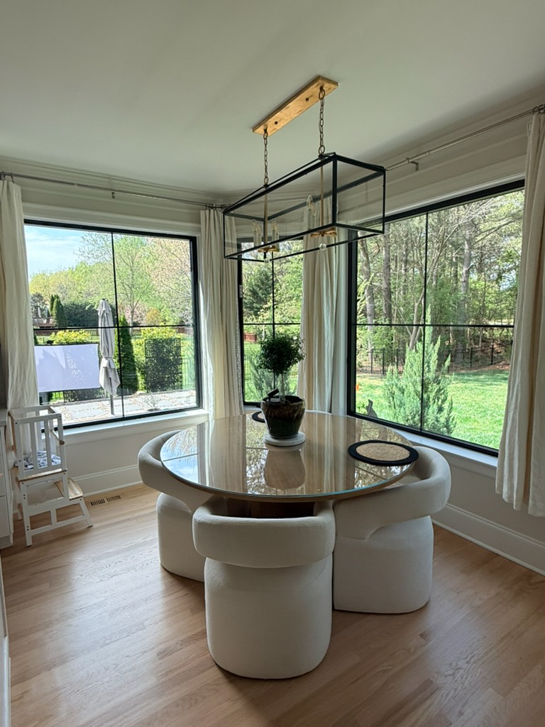 Black picture windows with grids in a kitchen.