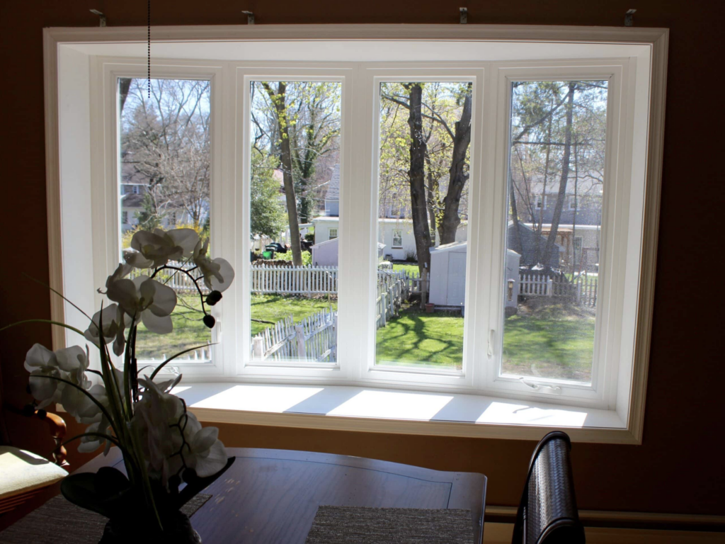 Interior of a white bow window.