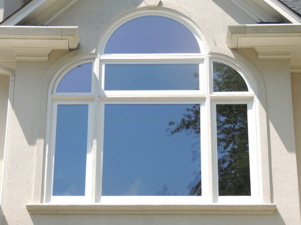 Round top and quarter round windows.