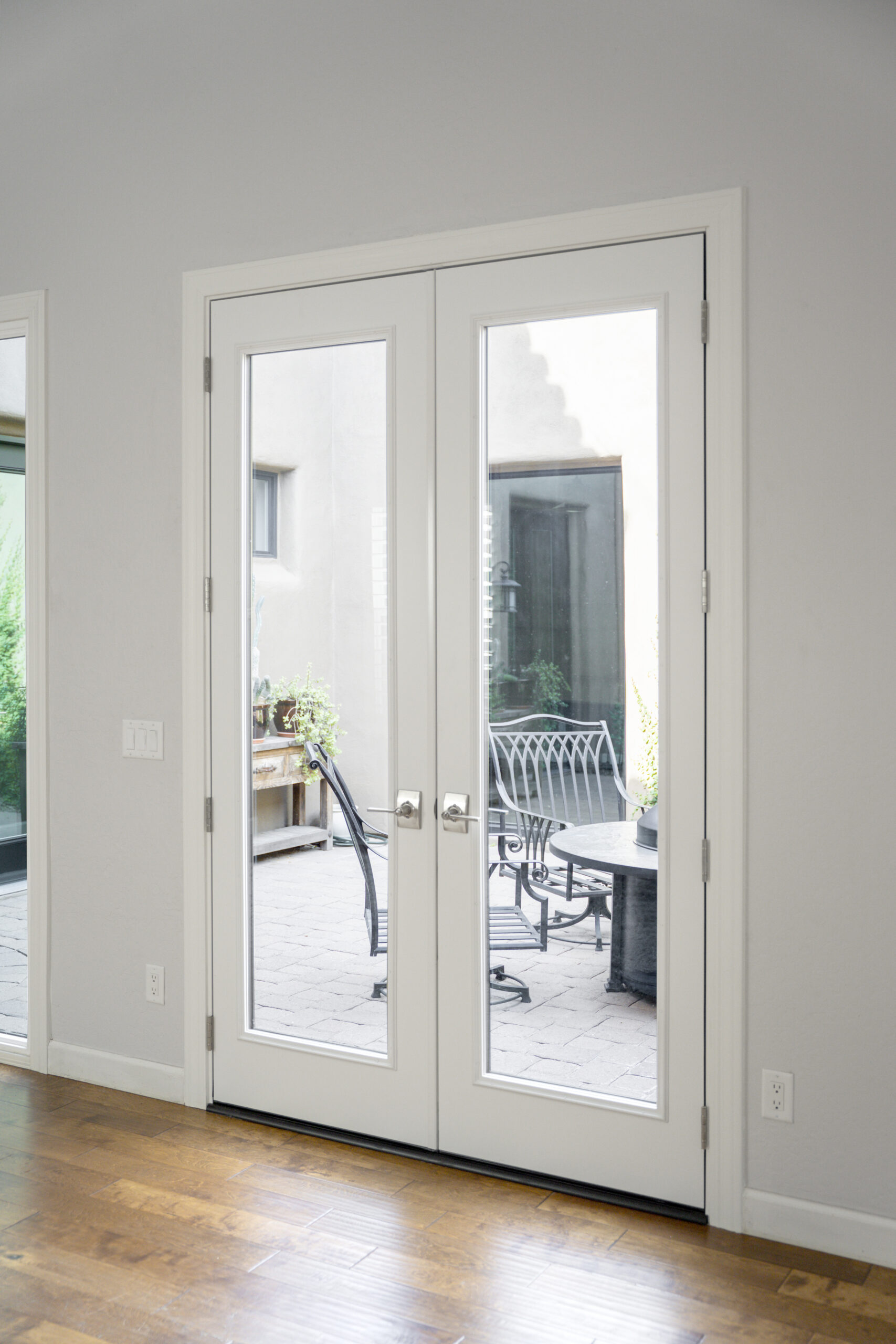 Smooth Legacy french door in snow mist white.