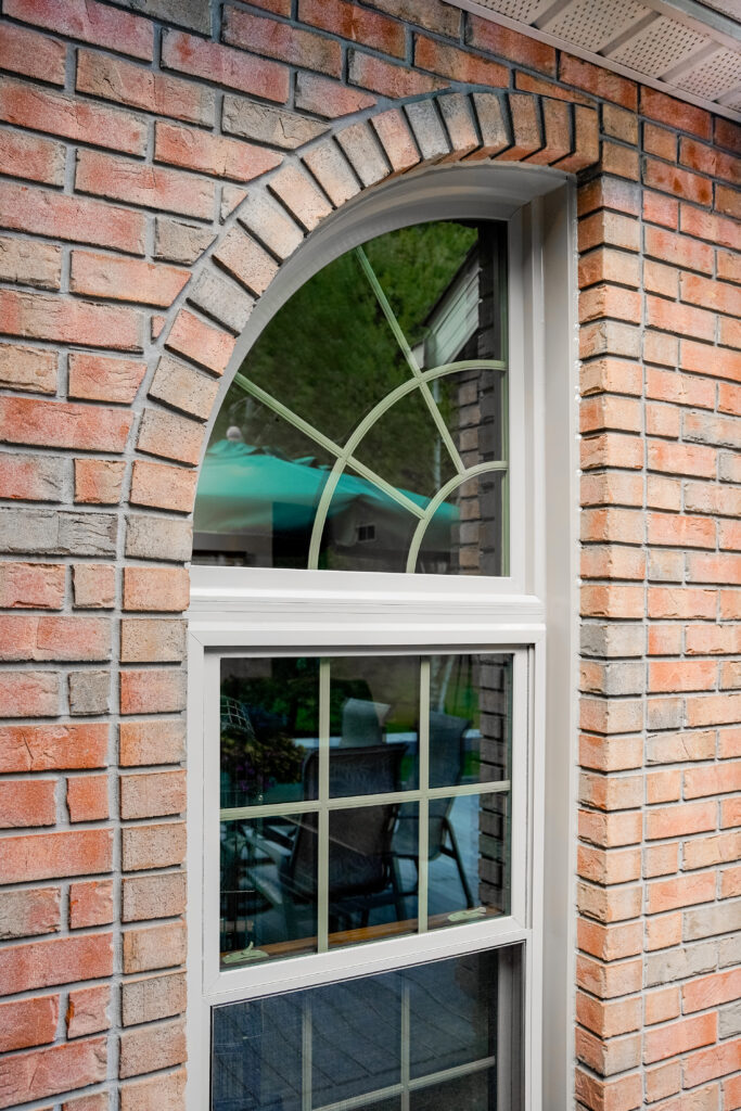 Aeris sandstone colored quarter-round window.