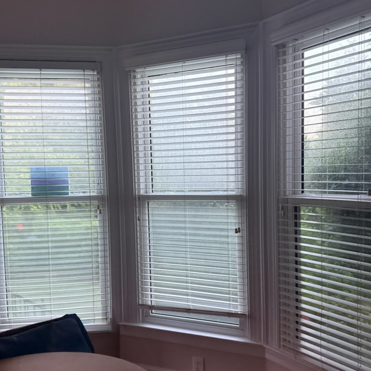 Condensation between glass panes.