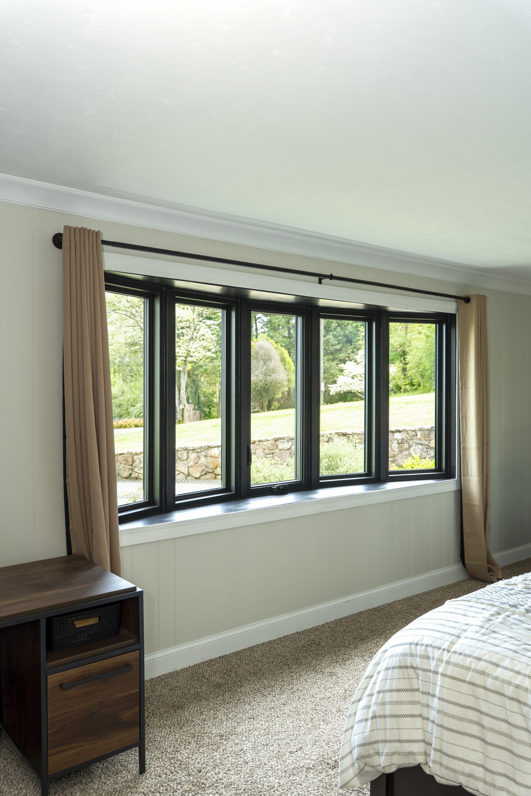 Interior view of matte coal black bow window.