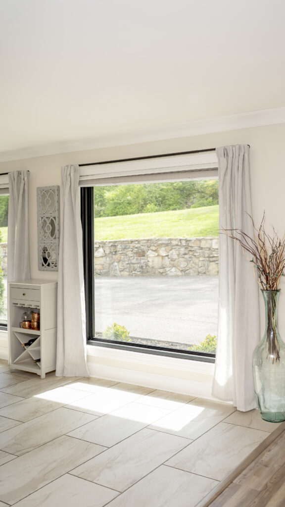 Endure picture window in textured matte coal black.