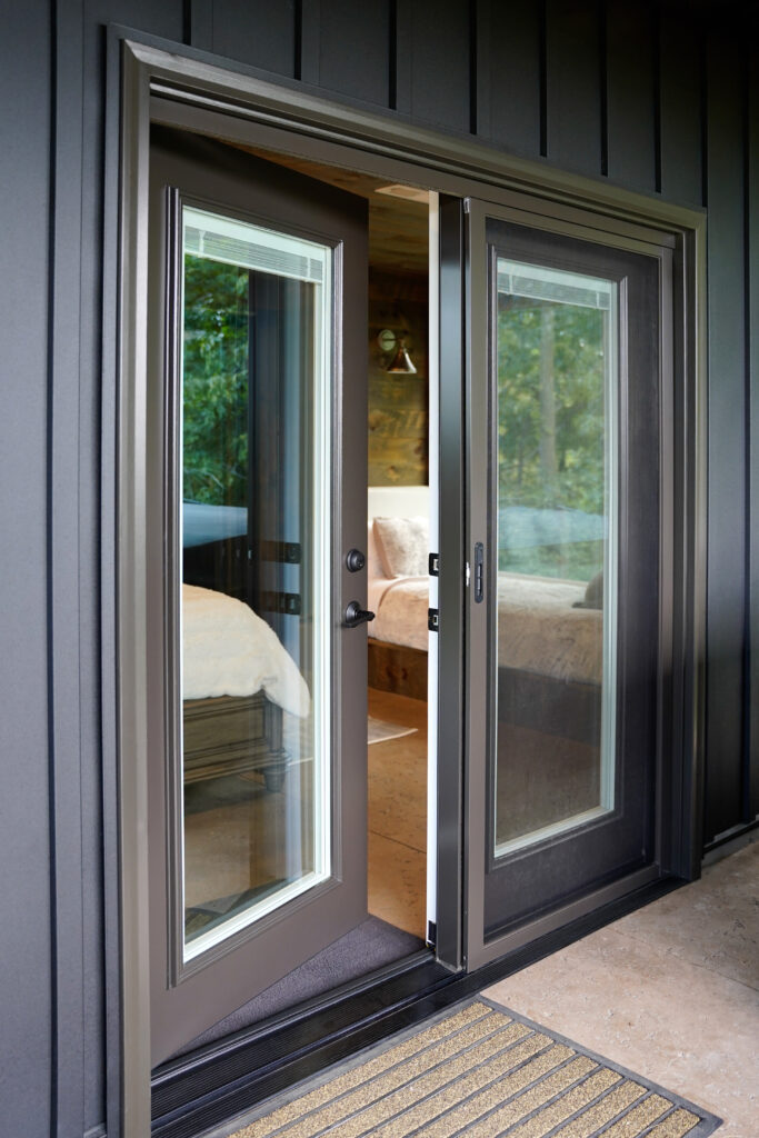 Rustic bronze legacy hinged patio door.