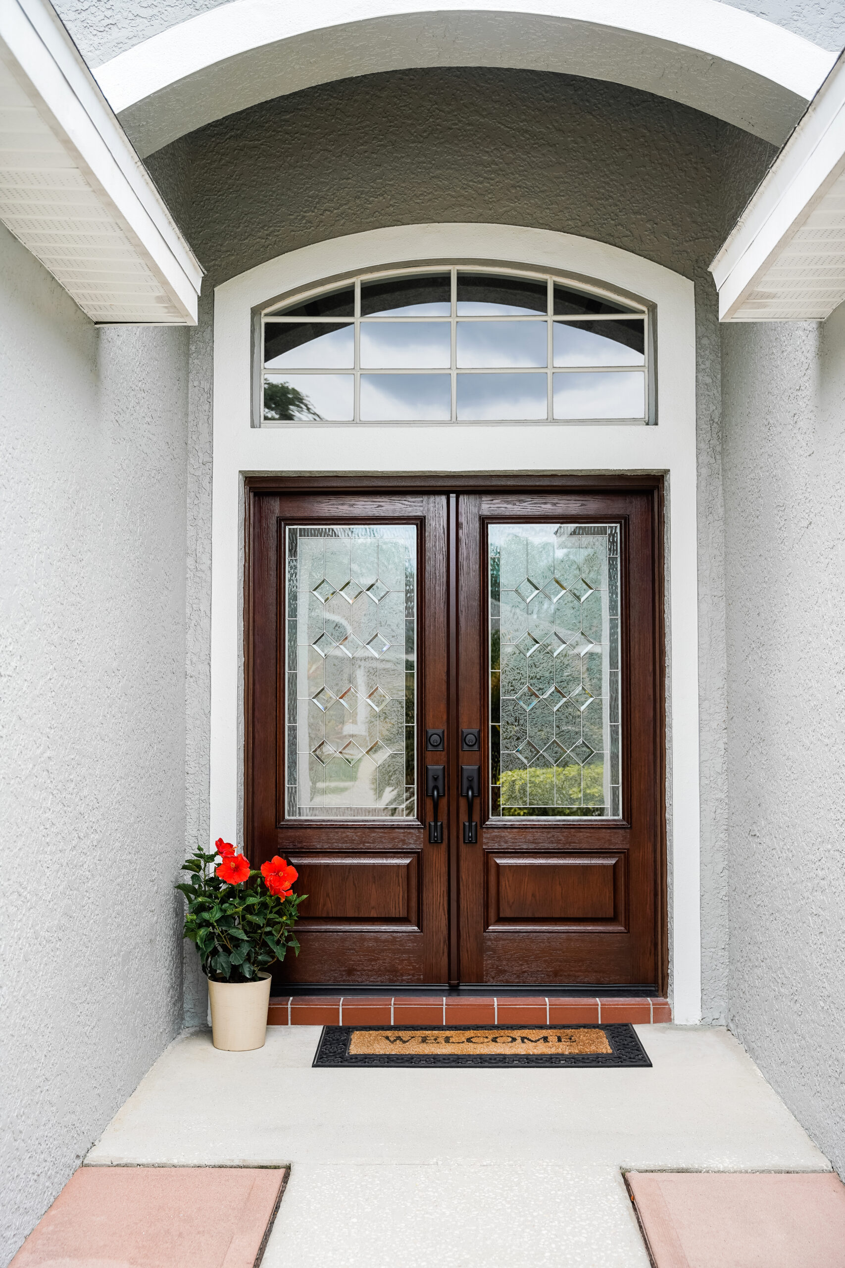 Signet Oak french entry door with decorative glass.