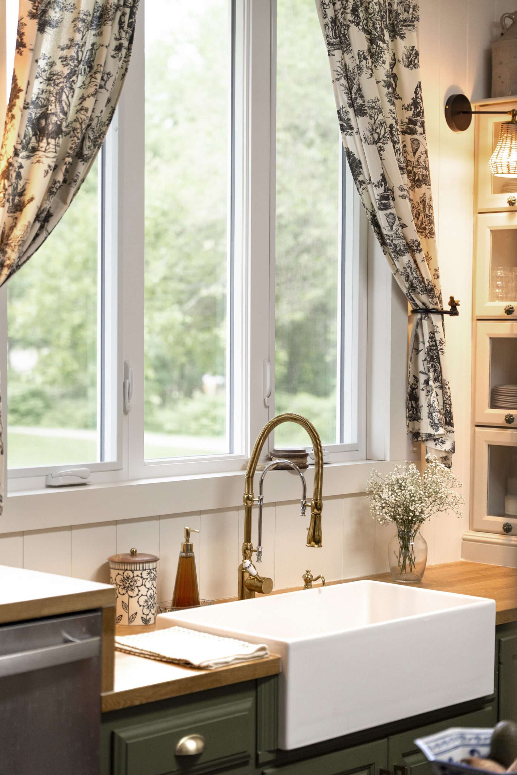 White Endure casement windows over kitchen sink.