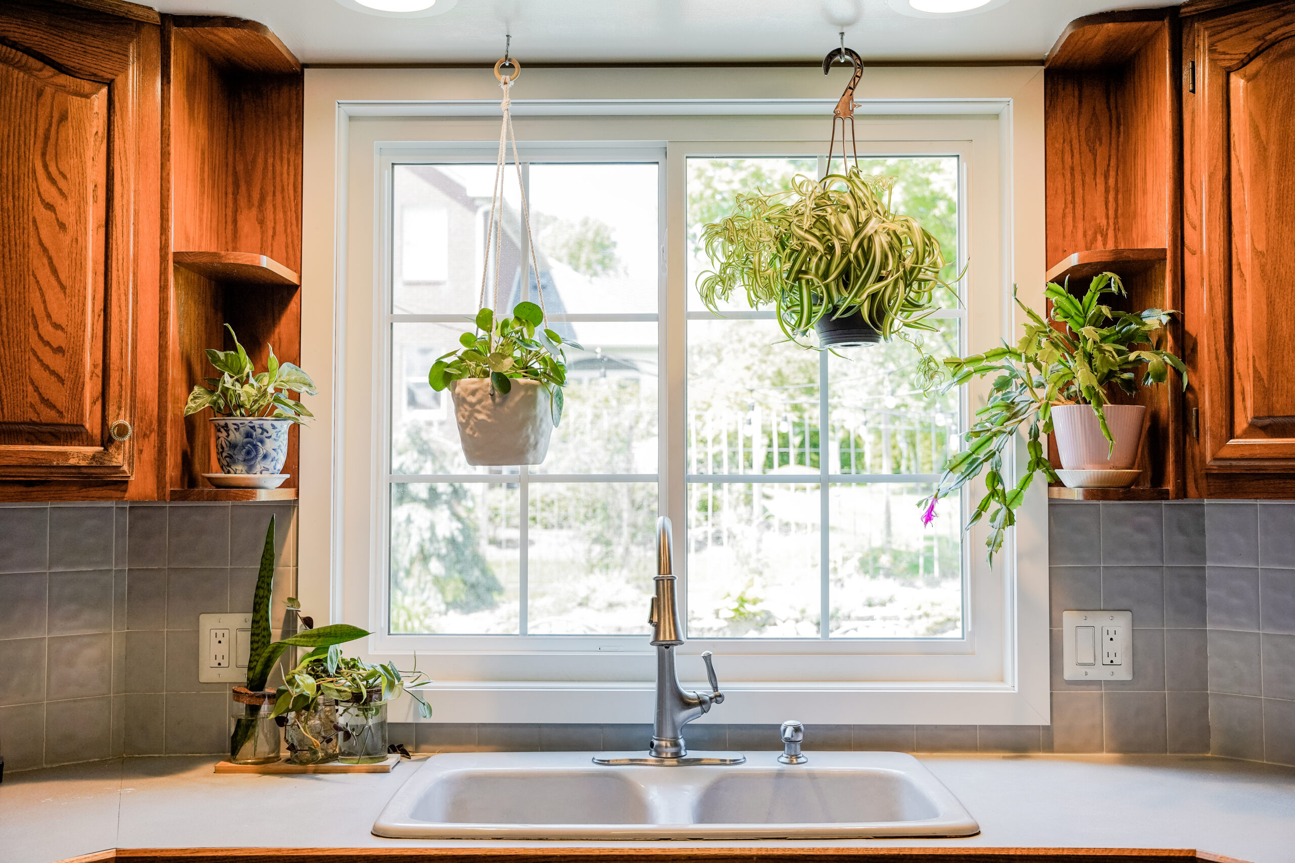 White Endure slider window with colonial grids.