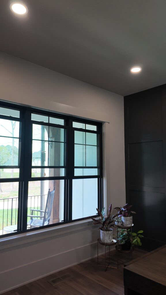 Three Endure double hung windows in Coal Black.