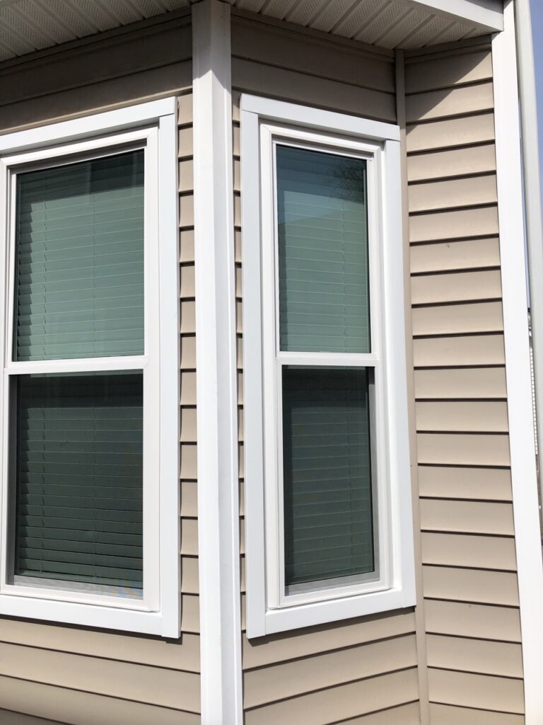 White double-hung vinyl windows.
