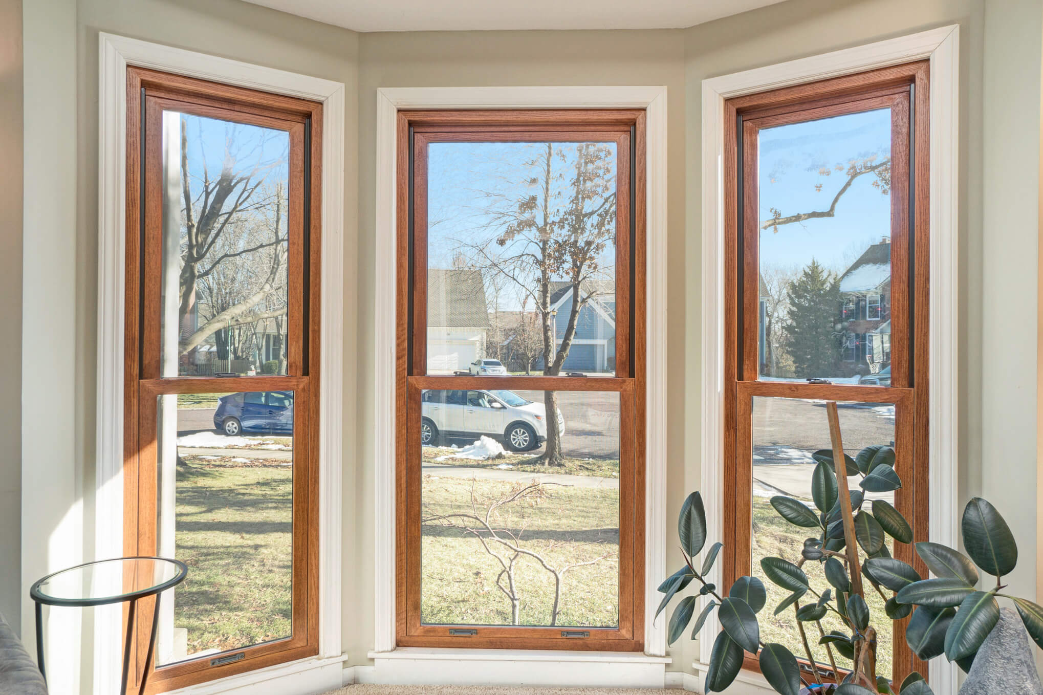 Professional window installer working on a home in Peyton CO