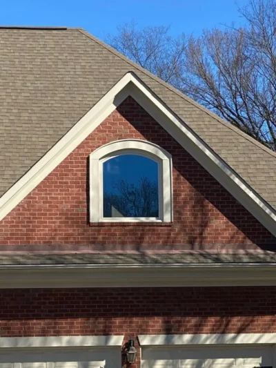 Professional window replacement technician working on a Denver area property