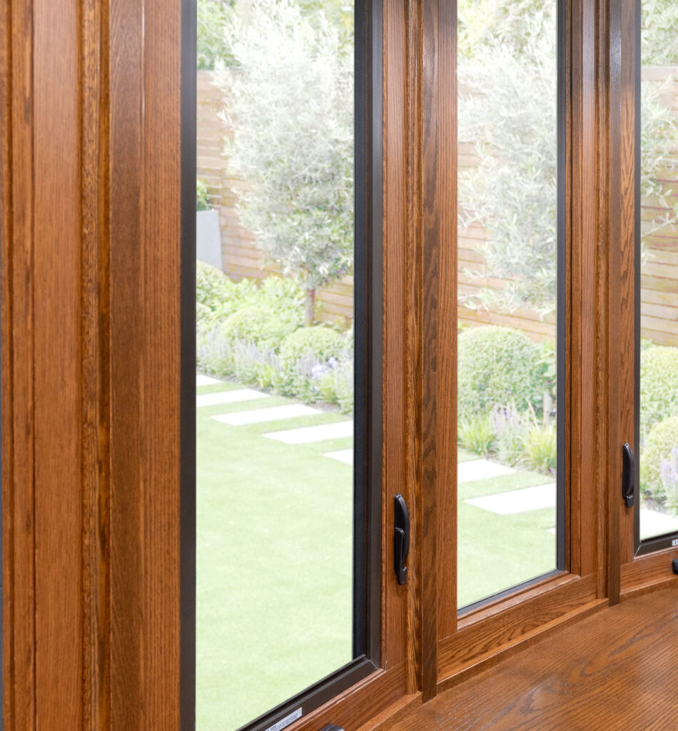 Closeup of Aeris bow window in woodgrain.