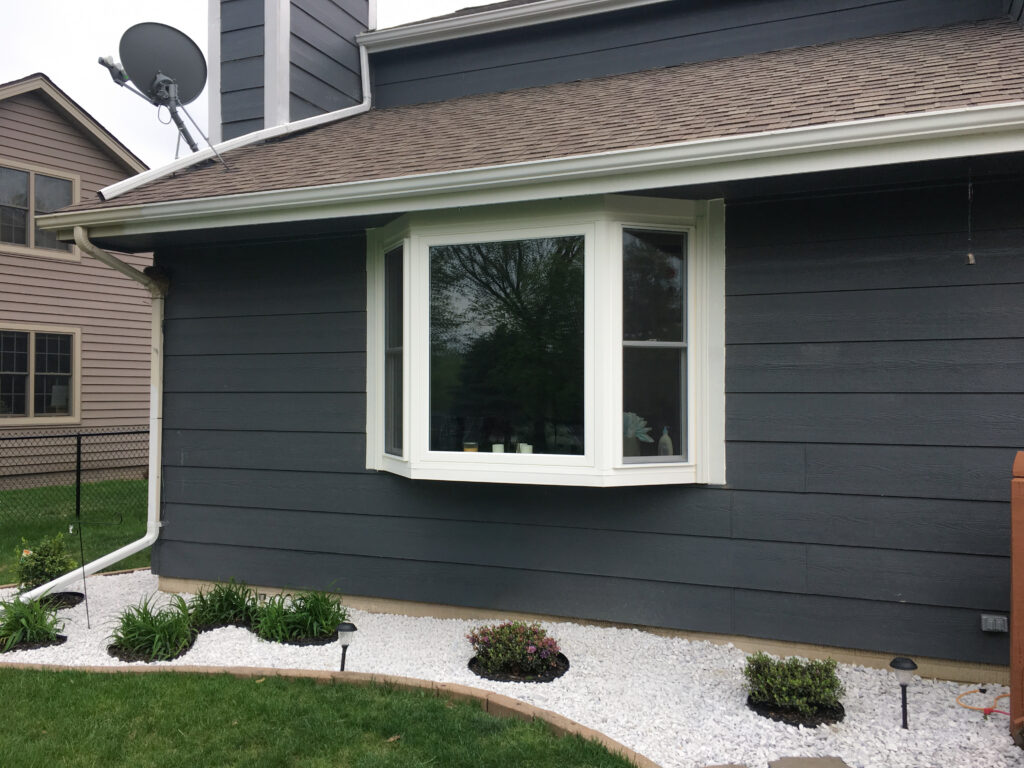 Bay window comprised of two double hung windows and a picture window.