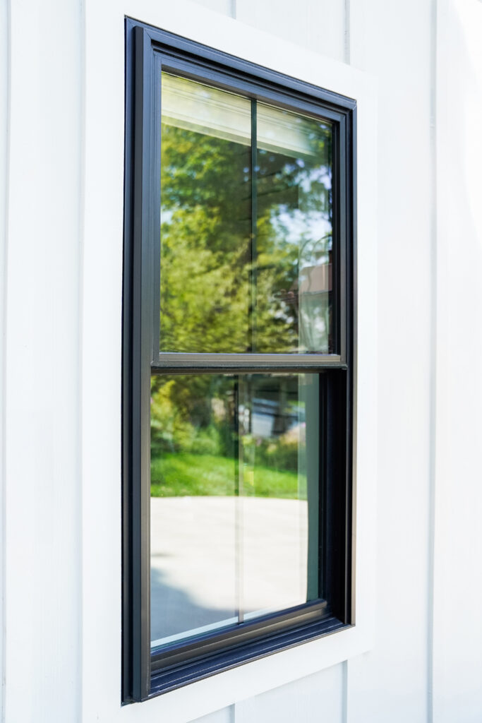 Endure double-hung windows with internal grids.