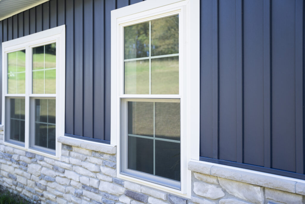 White double-hung windows with cottage grids.