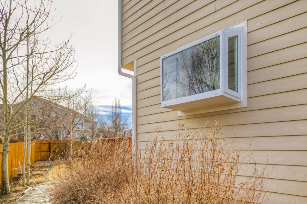 White garden window from exterior.