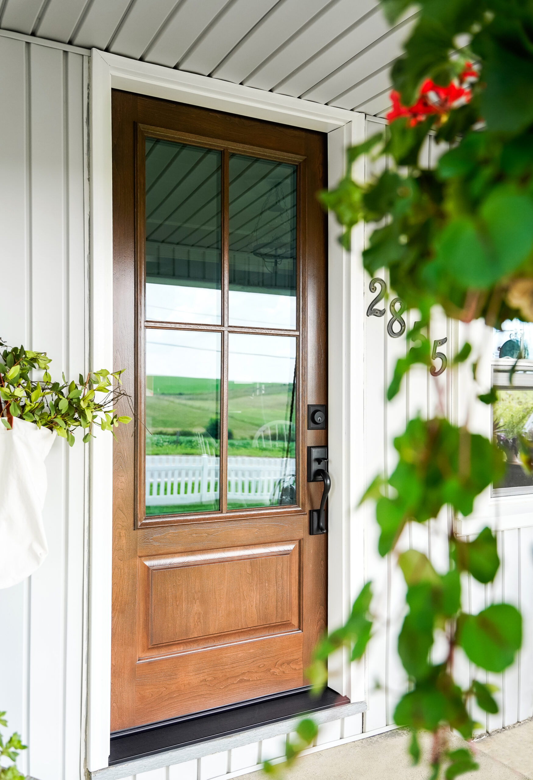 Cherry Signet entry door with SDL's.