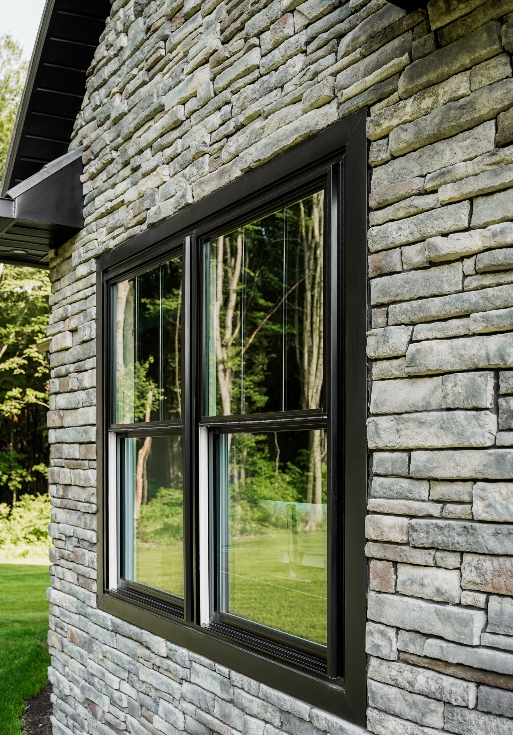 Coal black Endure double-hung windows.
