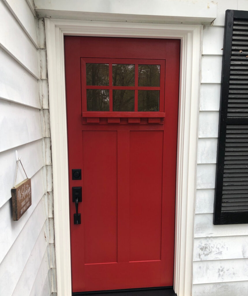 Red craftsman entry door.