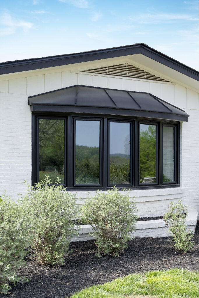 Textured matte coal black Endure bow window.