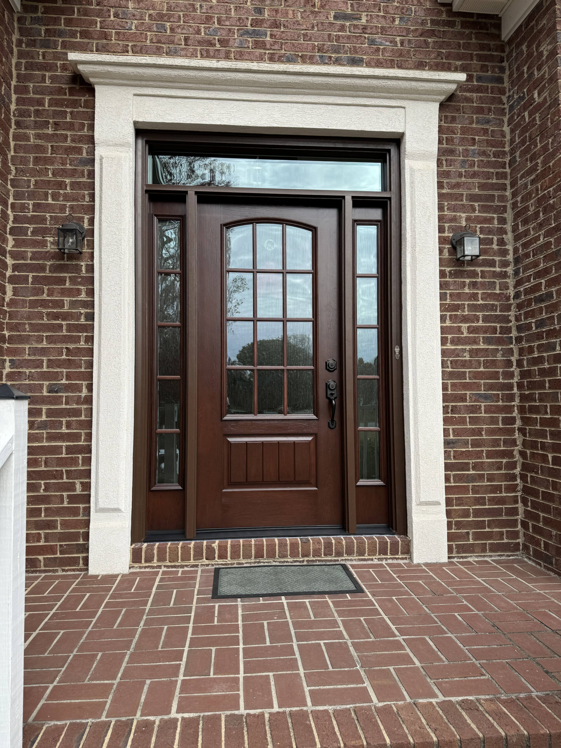 Brown entry door with grids.