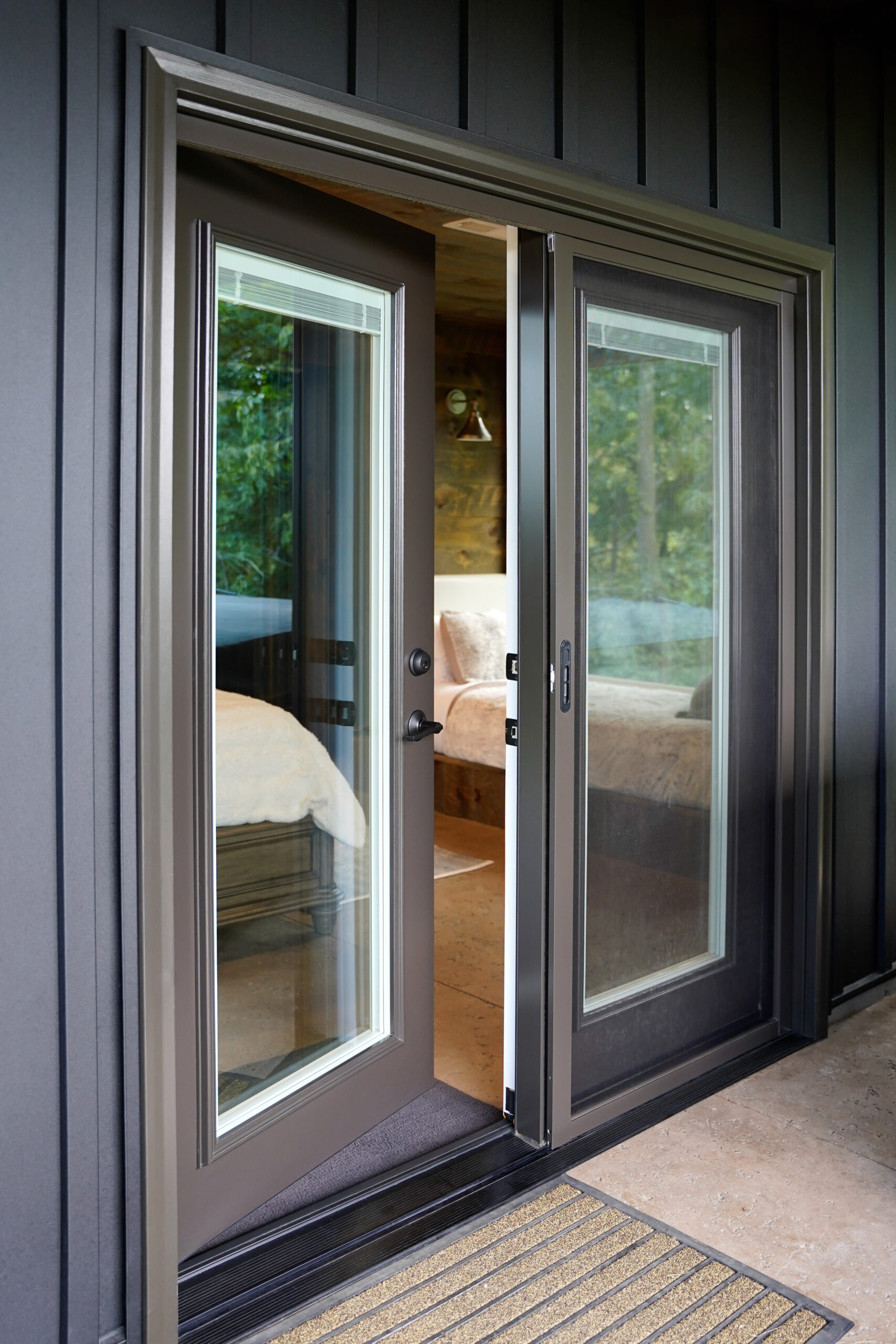 Legacy hinged patio door open.