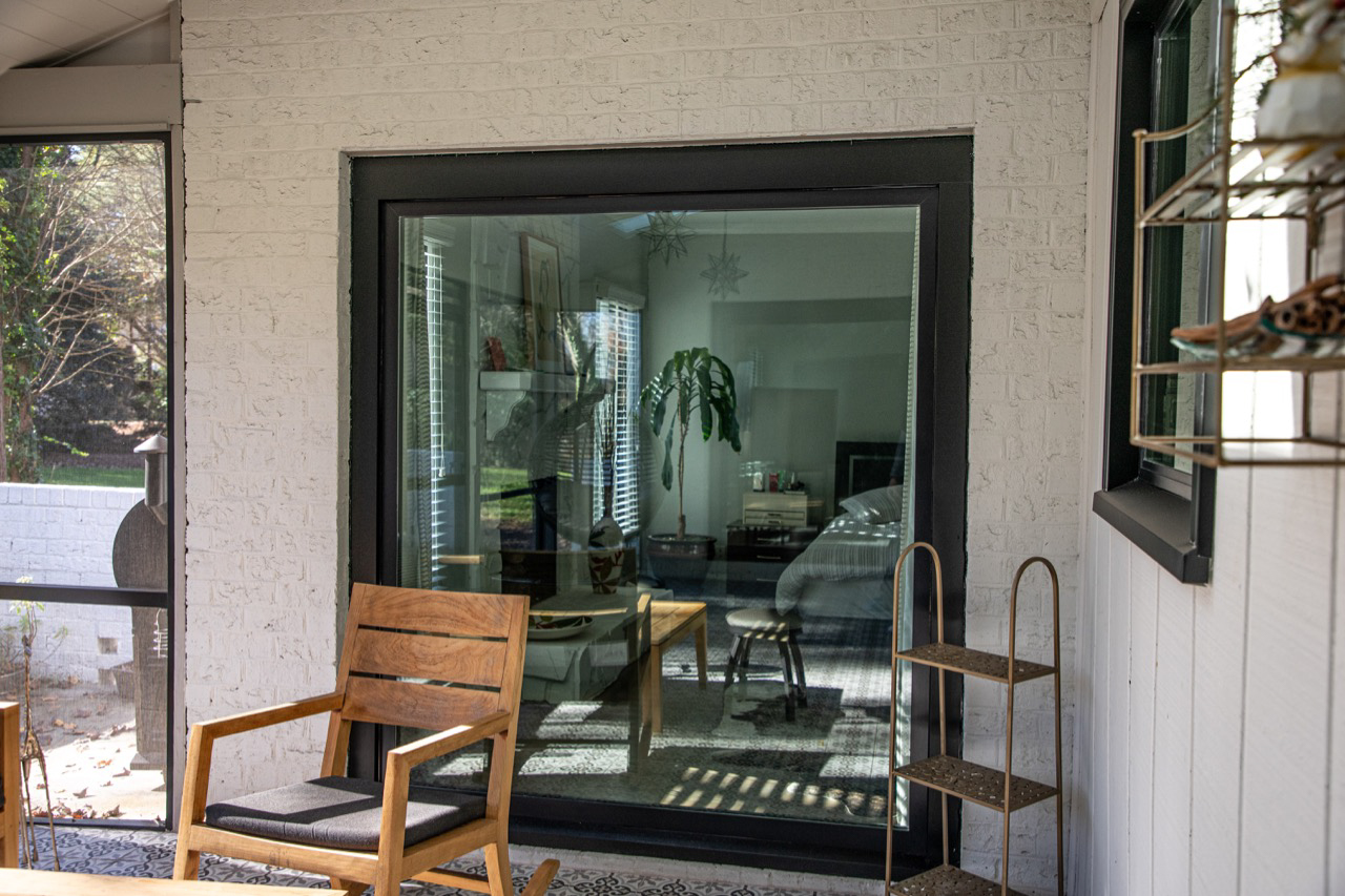Large picture window in matte black.
