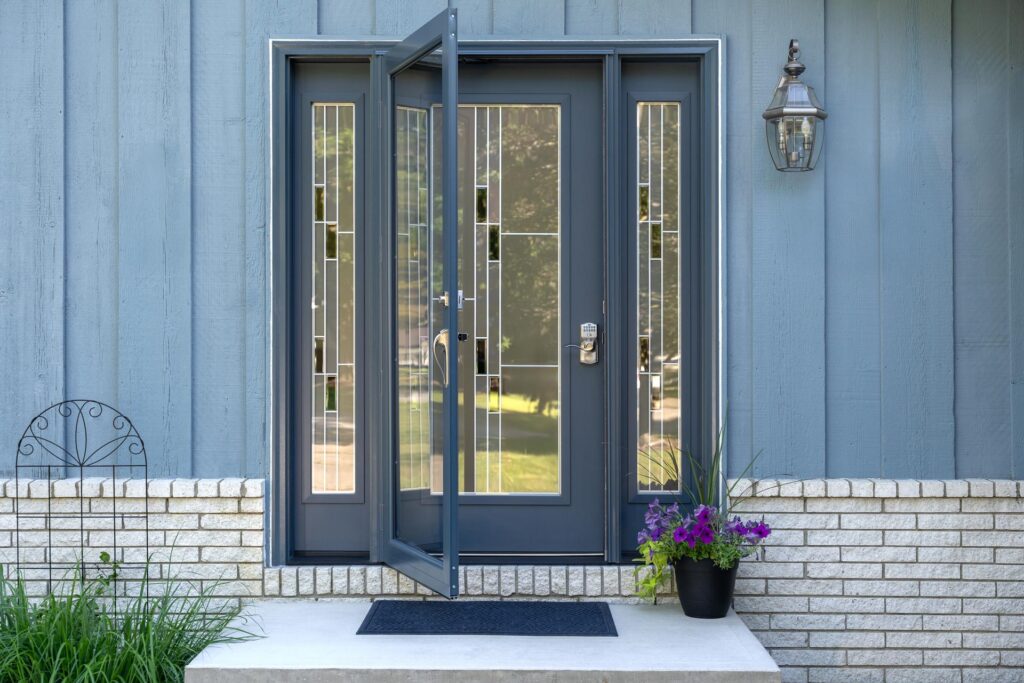 Blue painted fiberglass door with Geneva decorative glass.