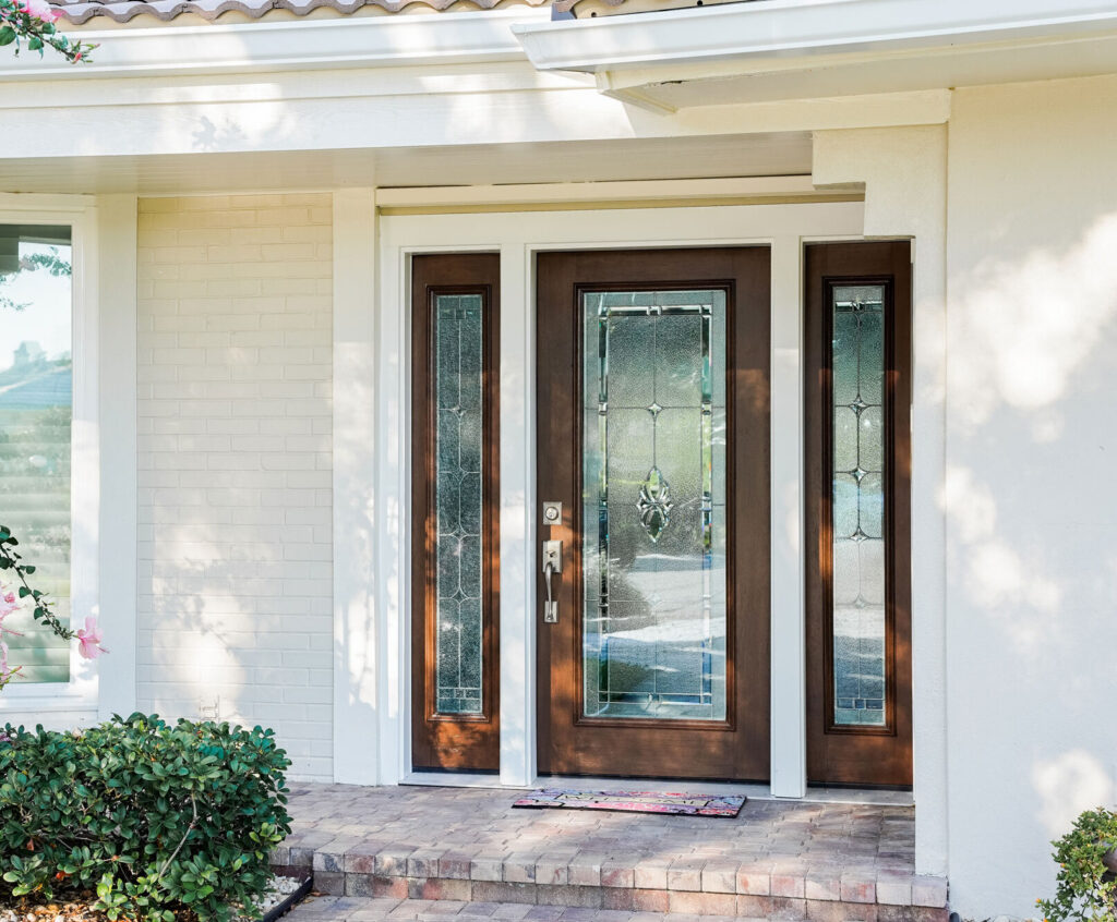Mahogany fiberglass entry door with Somerset decorative glass.