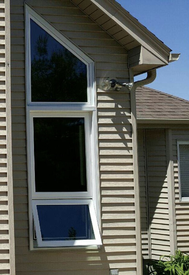 Open awning window below two picture windows.