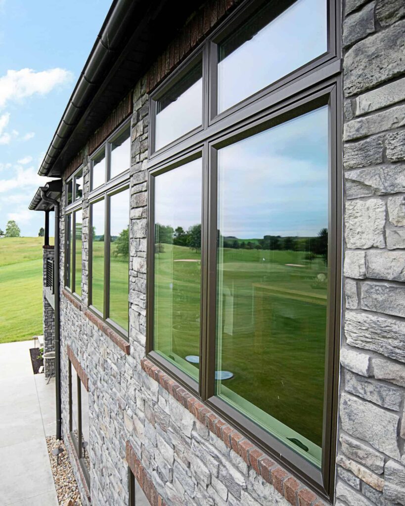 ProVia Aeris casement windows in rustic bronze