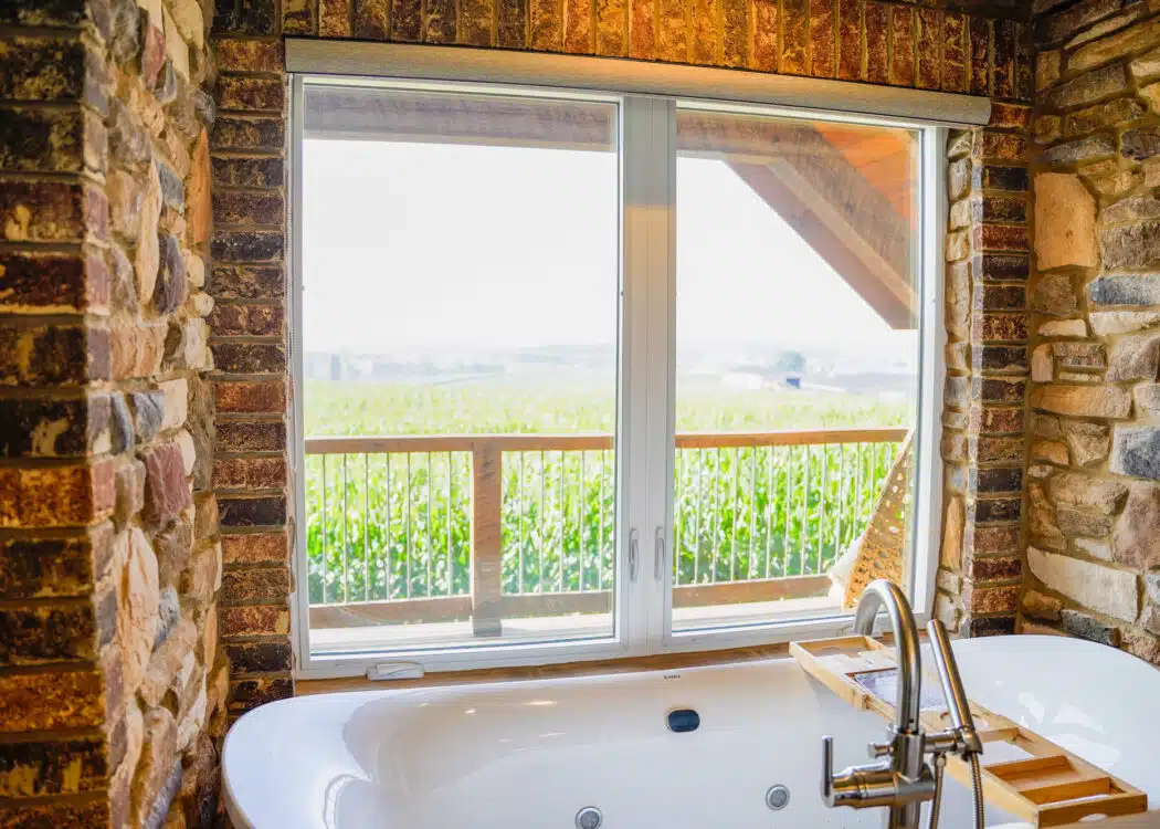 White casement windows in a bright home