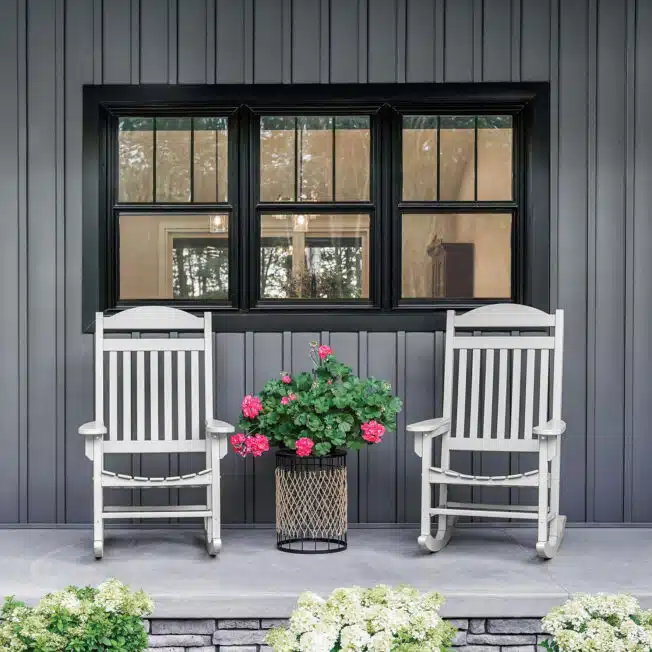 Black replacement windows with divided-light grids